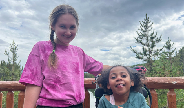 Ruby and her dad skiing